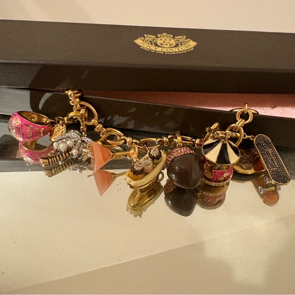 Juicy Couture Vintage -Gold Charm Bracelet with 7 charms. Rare - authentic
